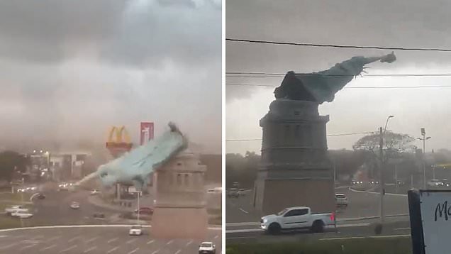 Statue of Liberty replica falls over during major storm in Brazil
